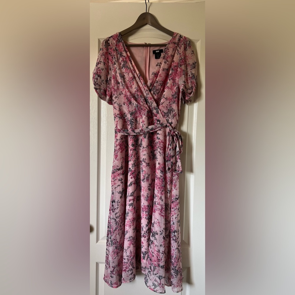 Beautiful spring DKNY dress.  Tea length. Used for a spring wedding shower .